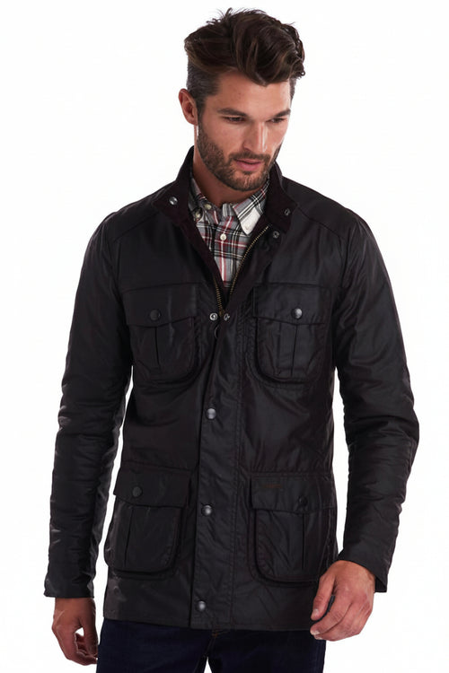 Dark wax jacket with snap front, stand collar, and four buttoned chest pockets
