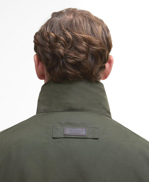 Olive waterproof jacket, back neck close-up with logo patch