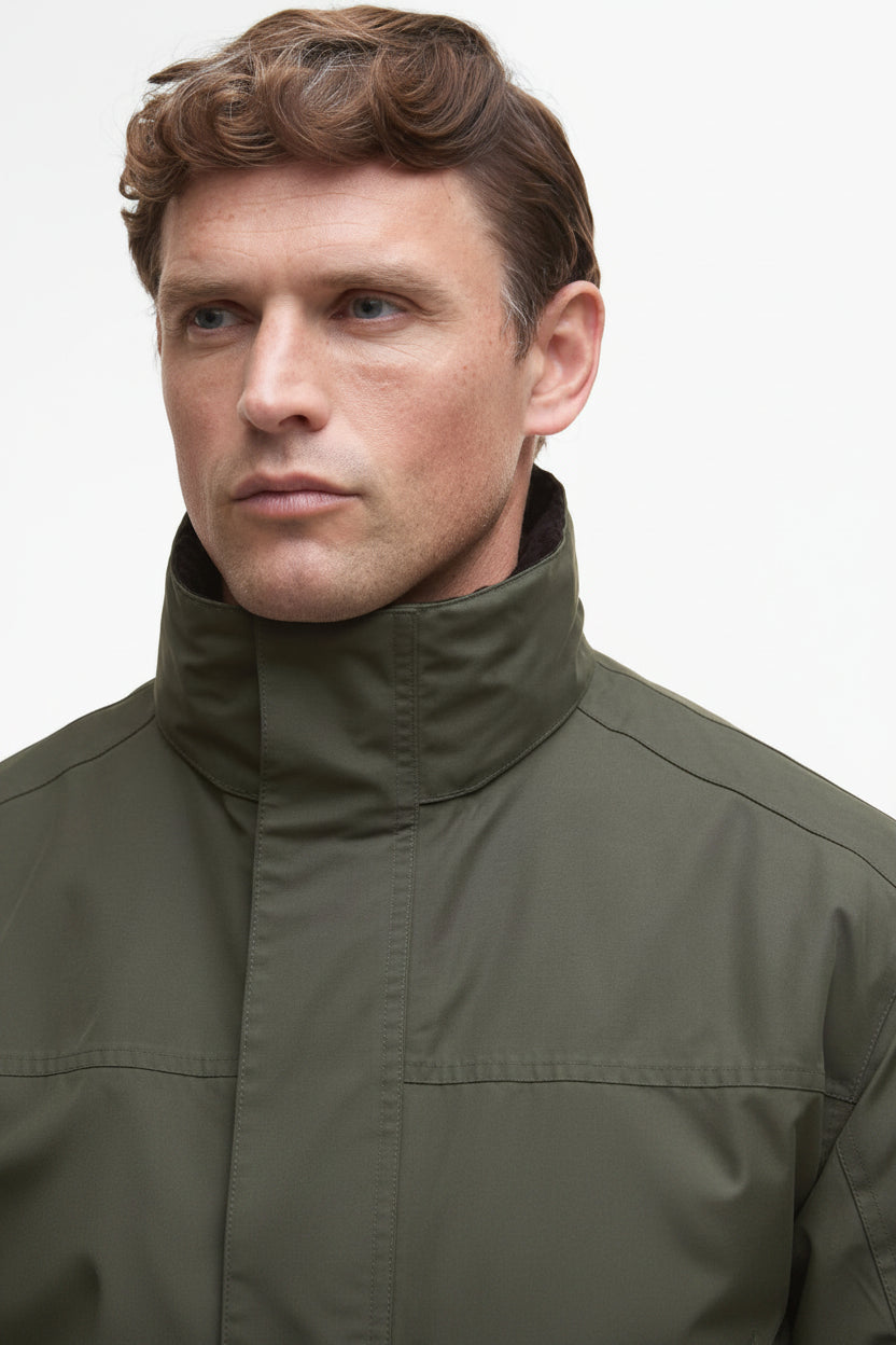 Olive waterproof jacket with high stand collar and buttoned front