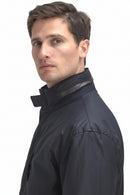 Men's waxed jacket collar with snap strap detail and full-zip front