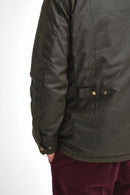 Barbour olive waxed jacket sleeve with snap cuff and side flap button