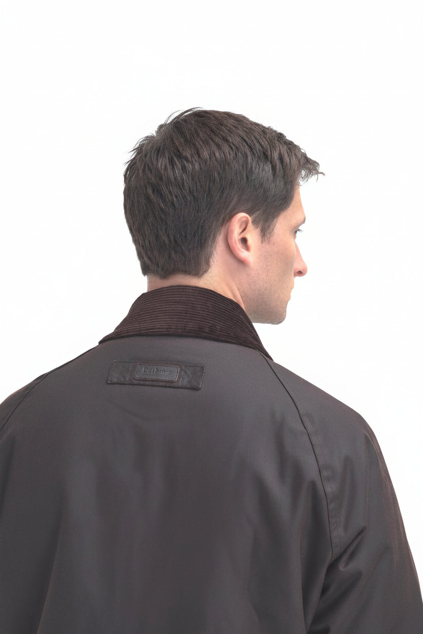 Men's dark brown wax jacket, back view, stand collar and button placket
