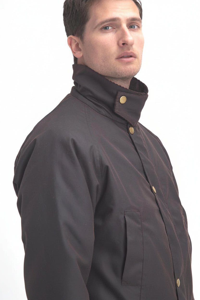 Men's dark brown wax jacket with gold snap buttons and chest pockets