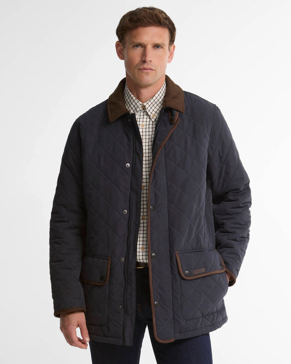 Barbour quilted navy jacket with brown cord collar, front snaps, side patch pockets