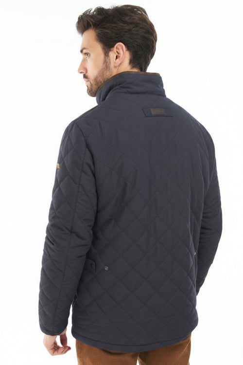 Navy quilted jacket back view with diamond stitching and rear label