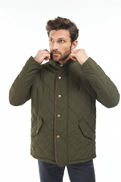 Olive quilted jacket with snap-button placket, chest pocket, and side seam pocket