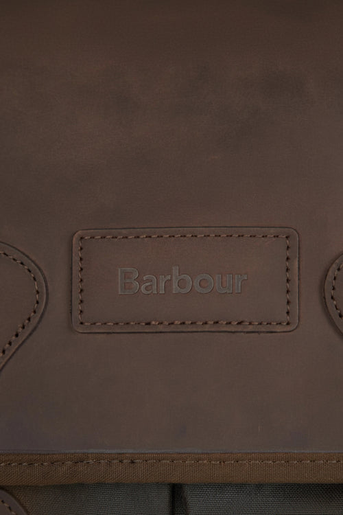 Dark olive waxed canvas Tarras bag with Barbour logo patch and stitched edges