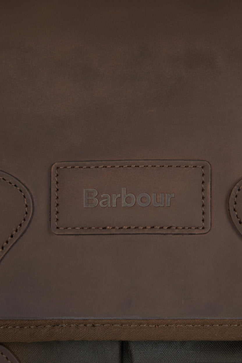 Dark olive waxed canvas Tarras bag with Barbour logo patch and stitched edges