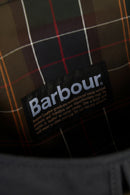 Barbour fabric care label inside the bag lining