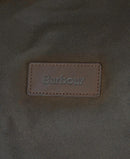 Barbour logo leather patch on olive wax holdall bag front