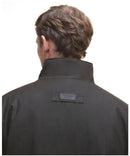 Back of Barbour Westward wax jacket - Olive with Barbour logo patch at the collar