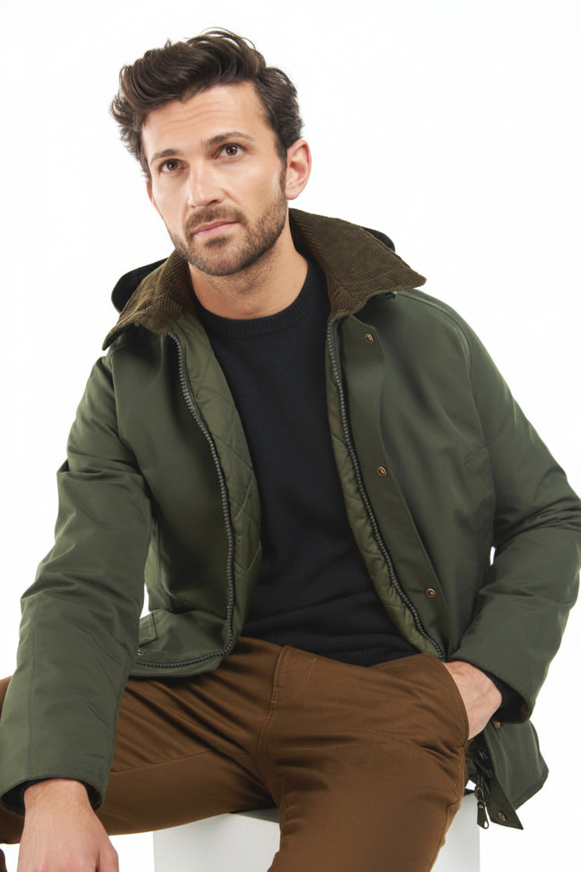 Men's sage green hooded winter jacket with zipper partially visible and cord collar.