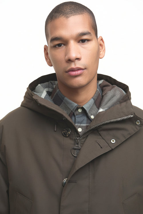 Barbour Beaufort waterproof parka, close-up hood with plaid inner collar, dark olive-brown.
