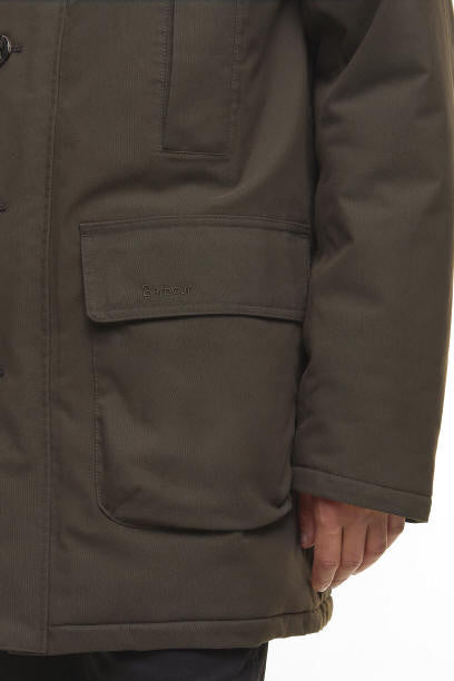 Barbour Beaufort waterproof parka, close-up sleeve pocket and inner panel stitching.