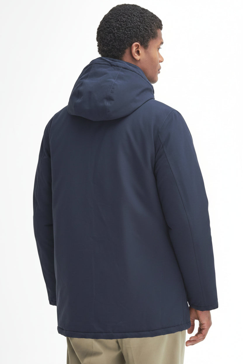 Navy waterproof parka back view with hood and straight hem.