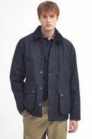 Navy waterproof Bedale jacket with stand collar, button placket, flap pockets