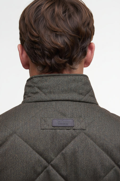 Dark olive quilted jacket back with stand collar and small logo label