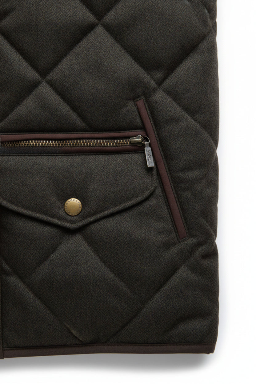 Dark olive quilted jacket with chest zip pocket and snap button detail