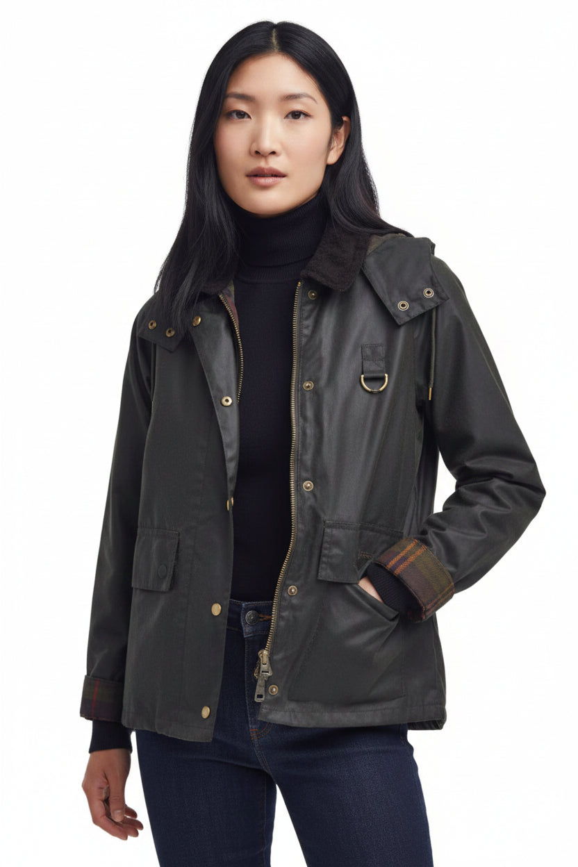 Women's waxed hooded jacket in dark olive with snap buttons, chest pockets, drawcord hem.