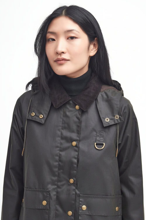 Waxed jacket with hood in dark olive, brass snap buttons, two front pockets, brand patch.