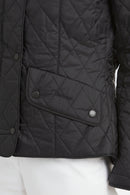Barbour women’s black quilted jacket, front zipless placket with snap pockets