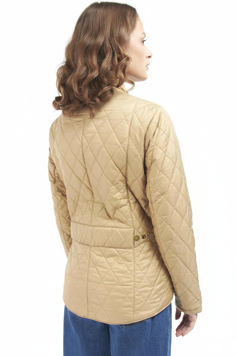 Quilted tan jacket back with diamond stitching and buttoned waist detailing