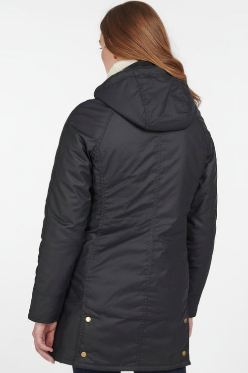 Women's navy wax cotton jacket with hood, back view, gold snap hem detail