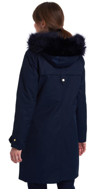 Women's navy waterproof parka, rear view, faux-fur hood trim and snap placket