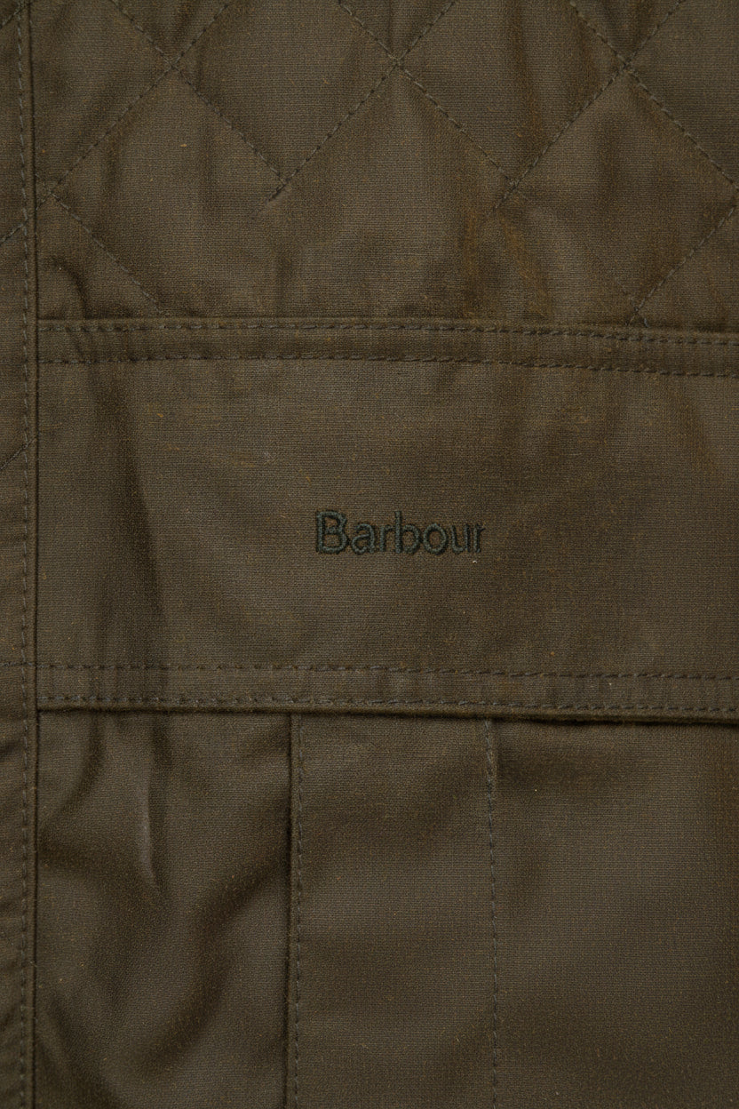 Olive wax parka jacket front panel with Barbour logo patch