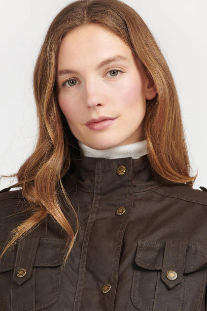 Women's Barbour wax jacket with buttoned collar and flap chest pockets