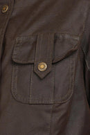 Barbour wax jacket pocket flap with round logo button and stitched detail