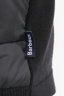 Barbour logo label on black ribbed knit sleeve cuff