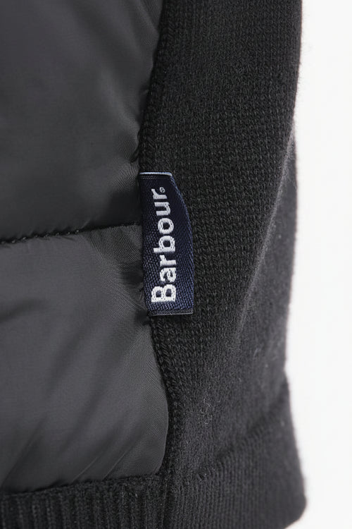 Barbour logo label on black ribbed knit sleeve cuff