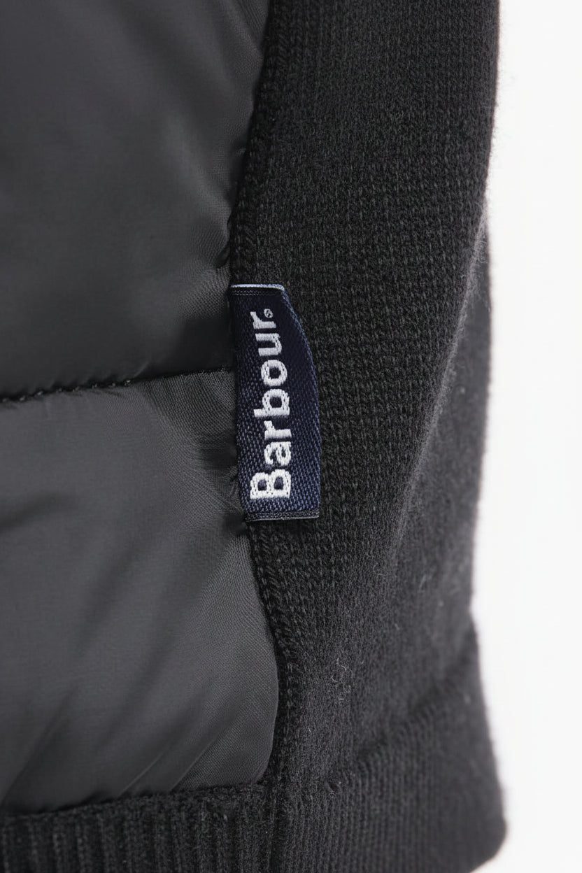 Barbour logo label on black ribbed knit sleeve cuff