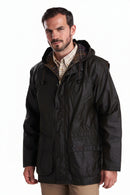 Men's wax jacket with hood, full zip, drawstring, and flap front pockets, dark.