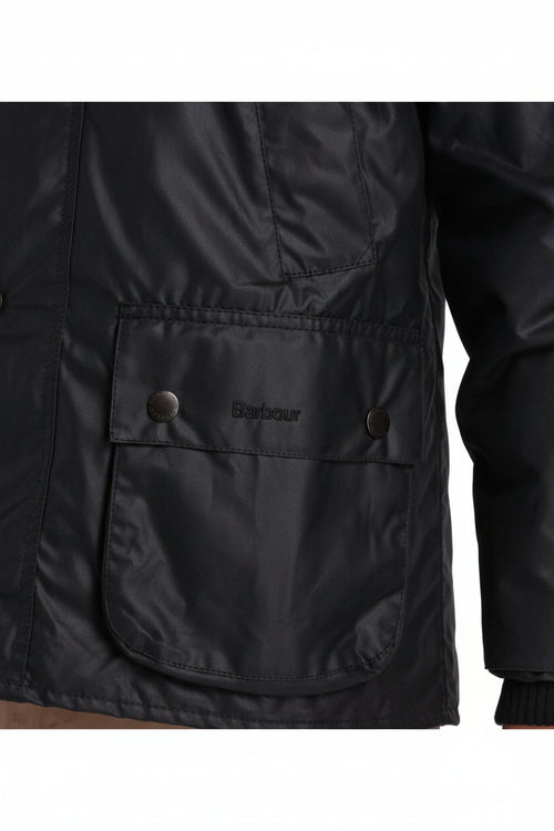 Men's Barbour waxed Bedale jacket lower pocket, black with snap buttons and logo