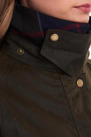 Barbour womens olive wax jacket collar with dark tartan lining and gold snap button