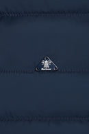 Barbour logo patch on navy quilted jacket with metal eyelet pull tab