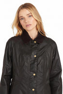 Ladies dark wax Beadnell jacket with stand collar and gold snap front placket
