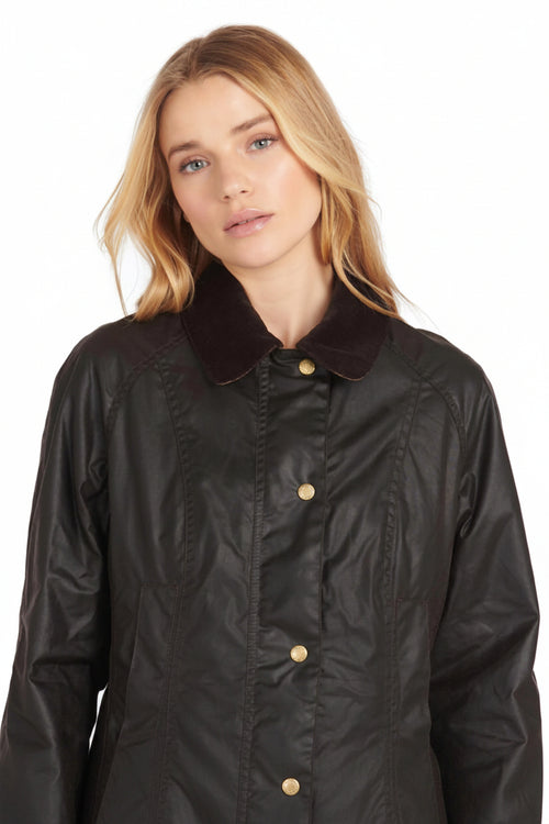 Ladies dark wax Beadnell jacket with stand collar and gold snap front placket
