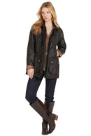Ladies dark wax Beadnell jacket with plaid cuffs, gold snaps, and front patch pockets