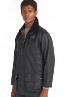 Barbour Beaufort wax jacket in dark navy, button front, flap pockets, high collar