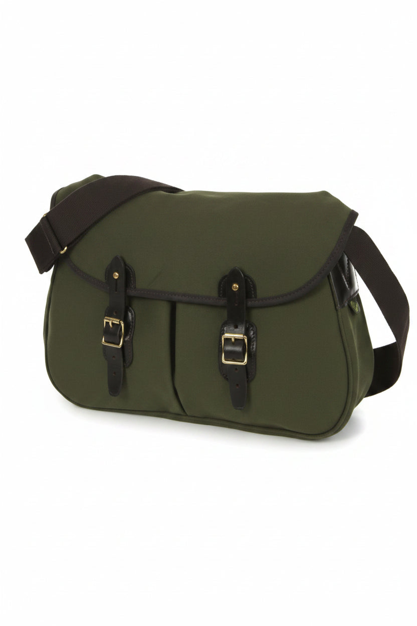 Small olive messenger bag with flap, front buckle pockets, and adjustable strap