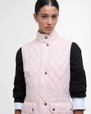 Barbour women's pink quilted gilet with stand collar, buttons, and chest pockets