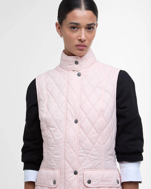 Barbour women's pink quilted gilet with stand collar, buttons, and chest pockets