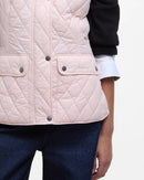 Barbour women's pink quilted gilet side view with flap pockets and button closure