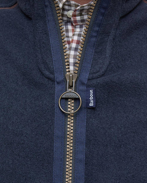 Navy fleece waistcoat full-zip with Barbour-branded zipper pull and woven tag