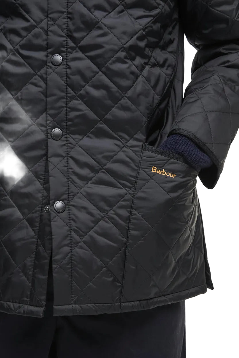 Barbour men's black quilted jacket sleeve and chest logo detail