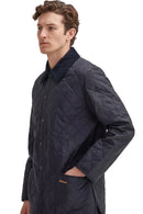 Men's Barbour Liddesdale jacket, dark navy quilted, button front and stand collar.