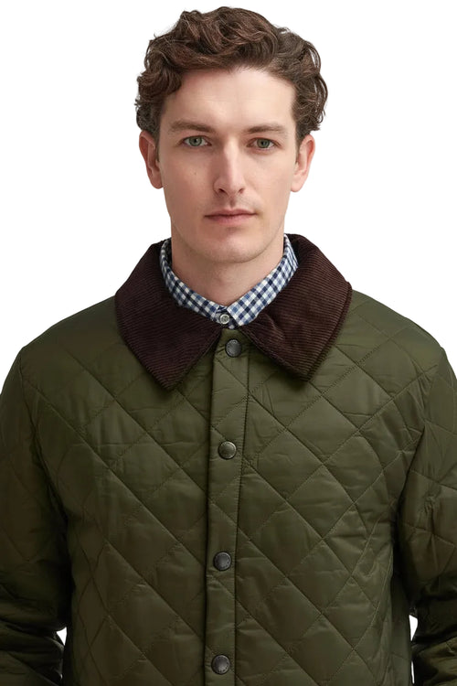 Men's Barbour olive quilted jacket close-up with brown collar and buttons